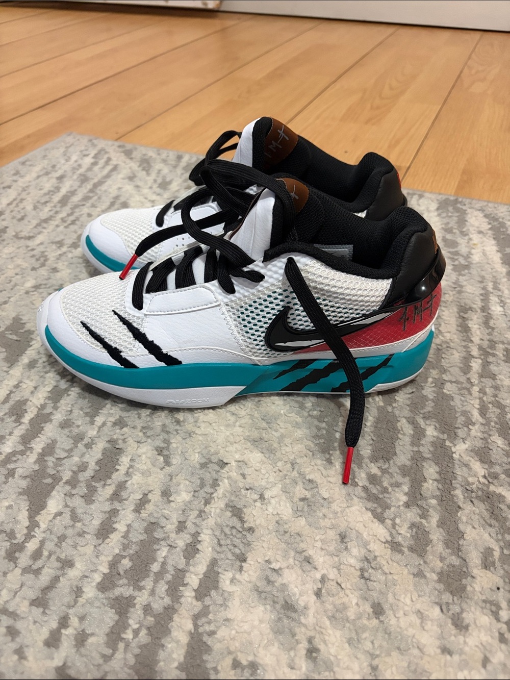 Nike Kids White, Teal & Black Low-Top Sneakers with Coral Accent